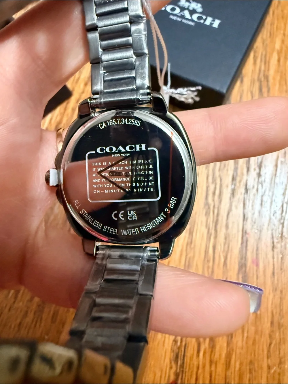 Coach Women’s Silver Bracelet Watch with Gray Dial and Gold Accents